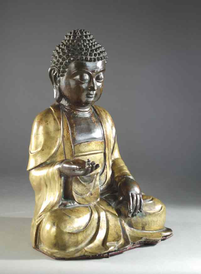 Appraisal: SINO-TIBETAN GILT BRONZE FIGURE OF SHAKYAMUNI BUDDHA STATUE seated in