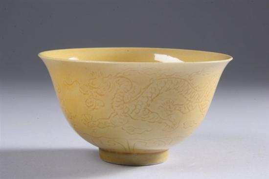 Appraisal: CHINESE YELLOW PORCELAIN BOWL Chenghua mark early Qing Dynasty Incised