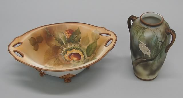 Appraisal: Vase featuring egret and dish featuring fruit design both with