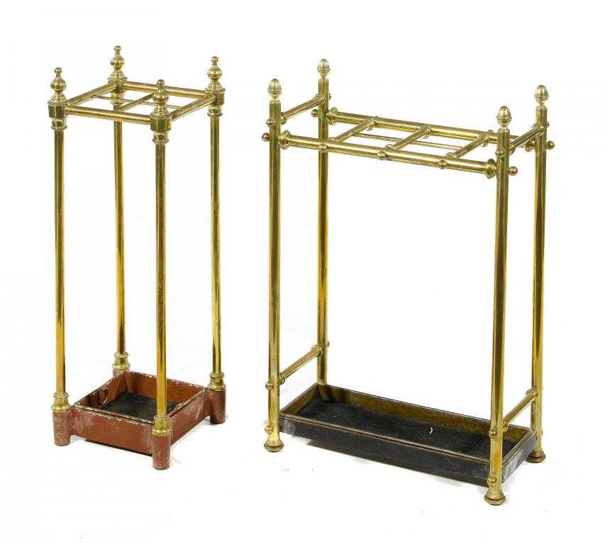 Appraisal: TWO BRASS STICK-STANDS one with four divisions the other six