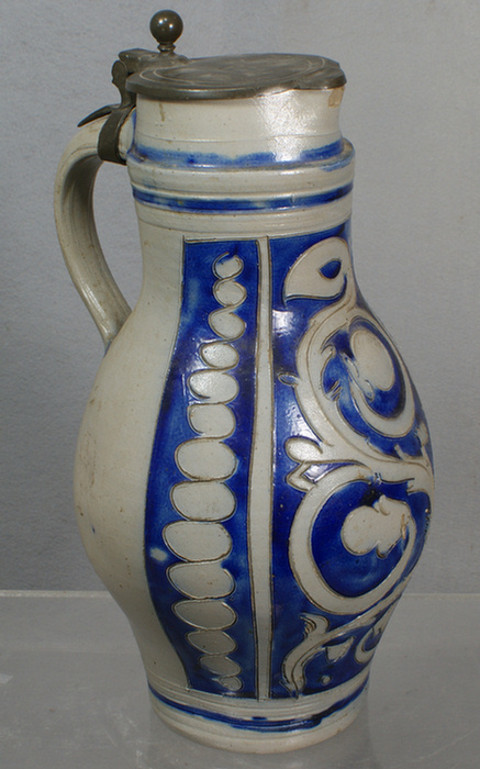 Appraisal: Incised blue decorated stoneware pitcher with pewter lid German tall