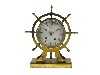 Appraisal: A FRENCH BRASS SHIP'S WHEEL NOVELTY MANTEL CLOCK the silvered