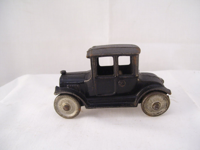 Appraisal: Cast Iron Car Original black paint No mark Measures high