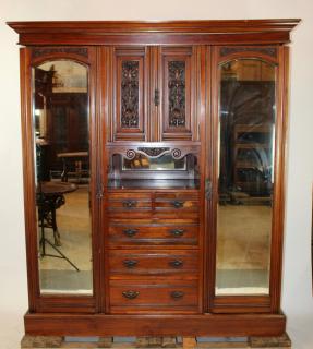 Appraisal: English wardrobe in mahogany with center drawers English wardobe in