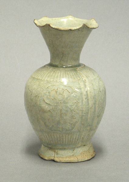 Appraisal: A small molded porcelain vase Song Dynasty With flared neck