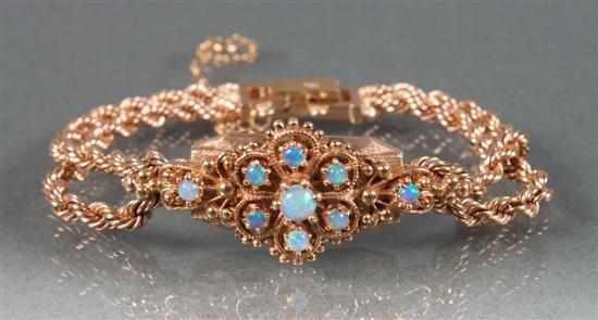 Appraisal: National k yellow gold and opal lady's bracelet-watch in length