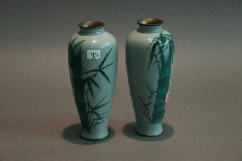 Appraisal: A pair of Japanese cloisonn vases with peony and bamboo