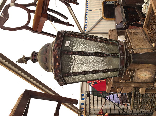 Appraisal: A COPPER LANTERN of studded and tapered octagonal form mounted