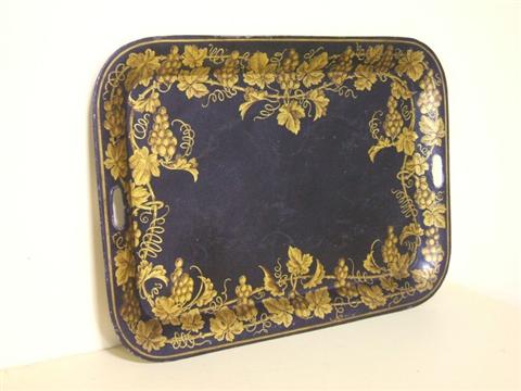 Appraisal: TOLE PEINTE TWO-HANDLED TRAY The tray with flaring rim painted