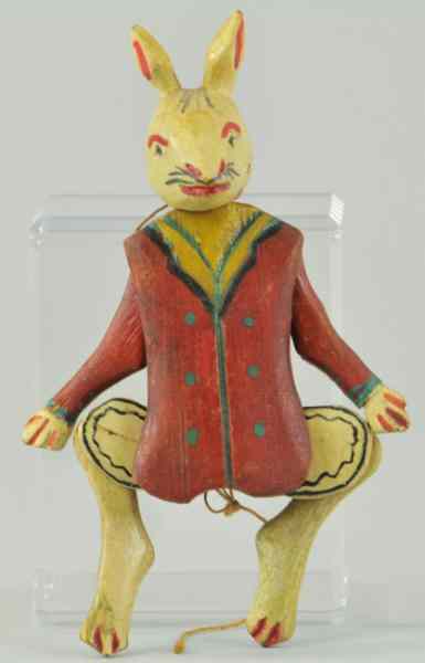 Appraisal: RABBIT HEAD JUMPING JACK Carved wood amusing figural head of