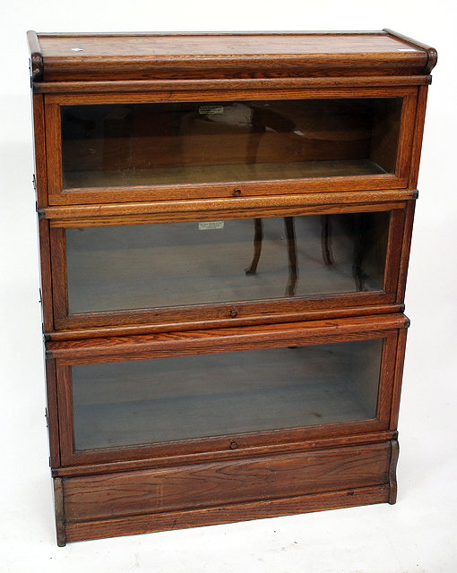 Appraisal: AN OAK GLOBE WERNICKE THREE SECTIONED BOOKCASE with glazed up