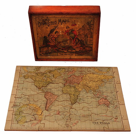 Appraisal: A VICTORIAN JIGSAW PUZZLE depicting a map of the world