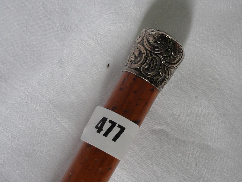 Appraisal: A gentleman's Malacca cane with a silver knop bearing London