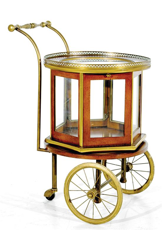 Appraisal: French style mahogany and brass rolling tea cart early th