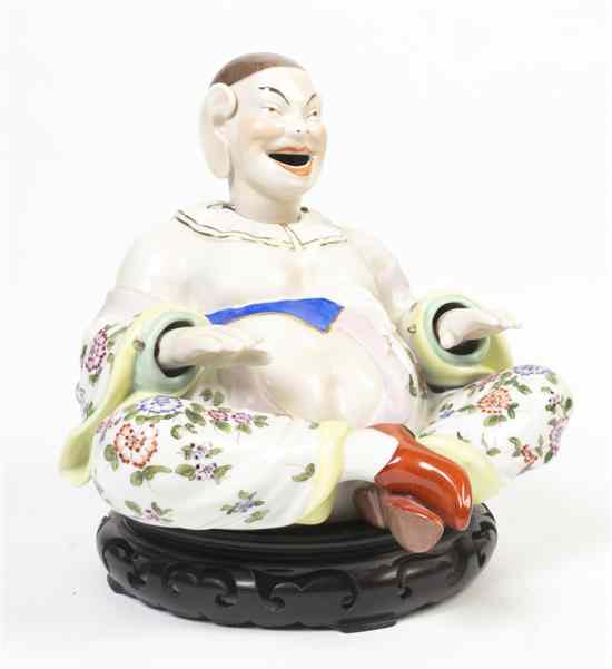 Appraisal: A Dresden Porcelain Nodding Figure after the Meissen model depicting