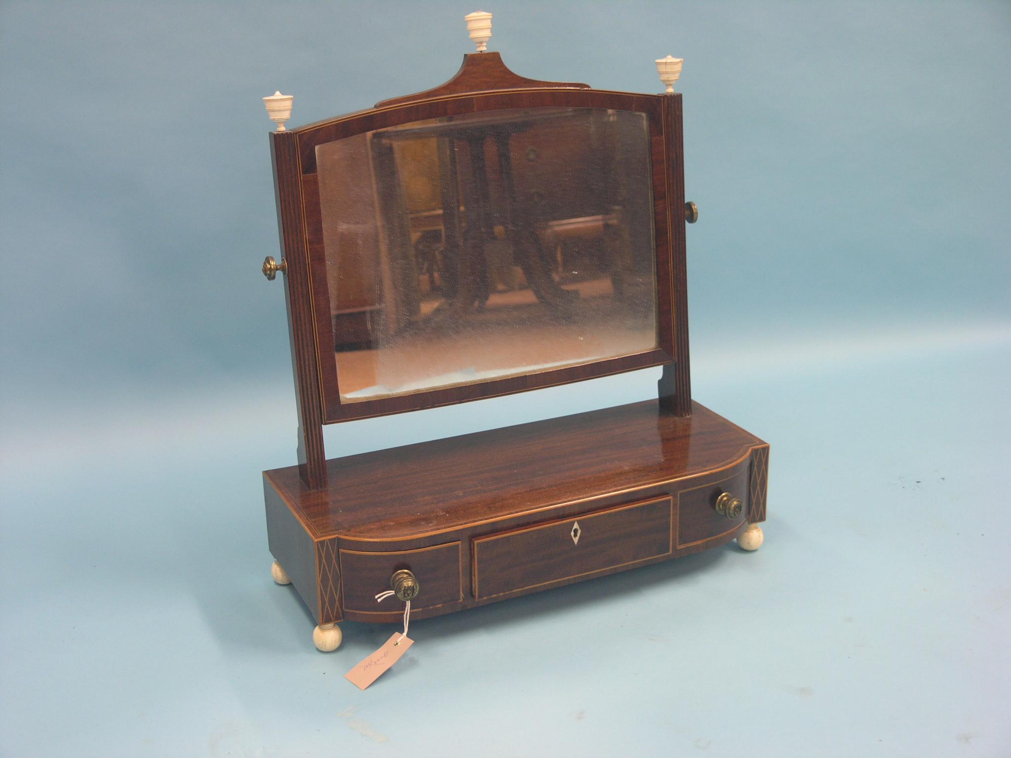 Appraisal: A Victorian mahogany toilet mirror box-base with three oak-lined drawers