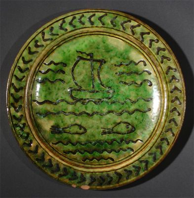 Appraisal: An early Michael Cardew Winchcombe Pottery charger slip decorated with