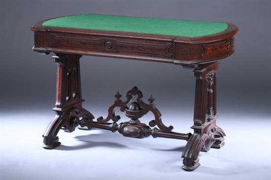 Appraisal: VICTORIAN CARVED WALNUT LIBRARY TABLE th century with inset green