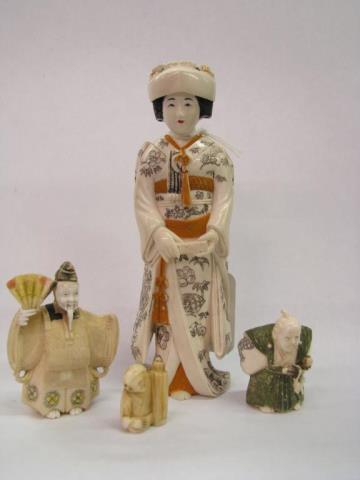 Appraisal: Group of carved ivory figurines three Netsuke figures and one