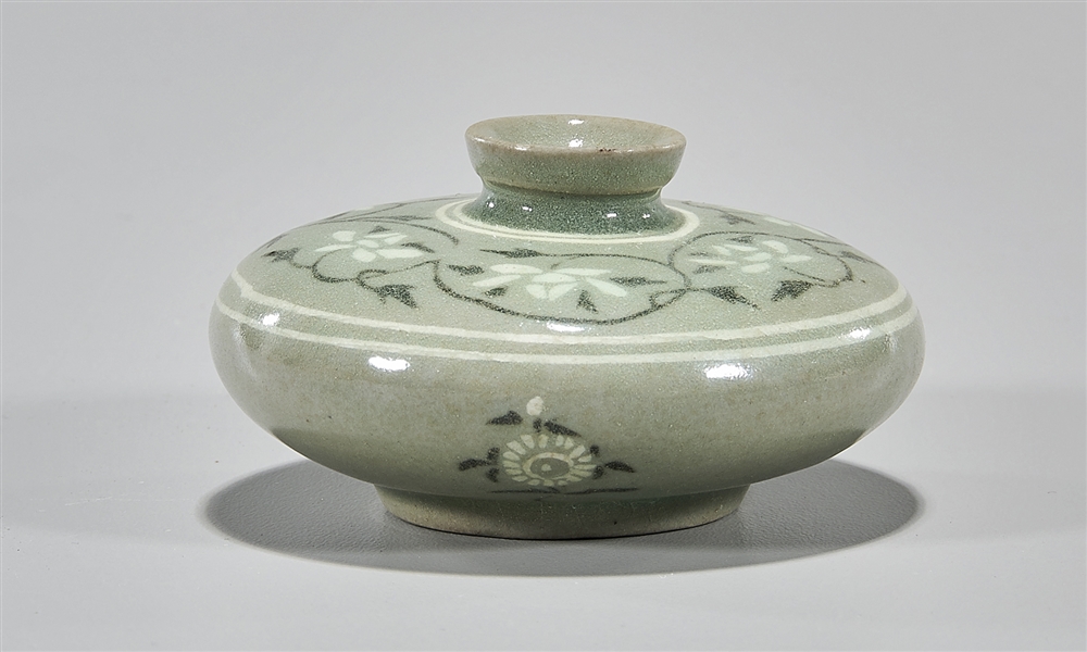 Appraisal: Korean celadon glazed cosmetic jar with floral designs wood box