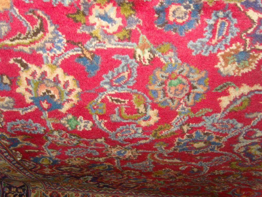 Appraisal: A red ground wool rug in the eastern style with