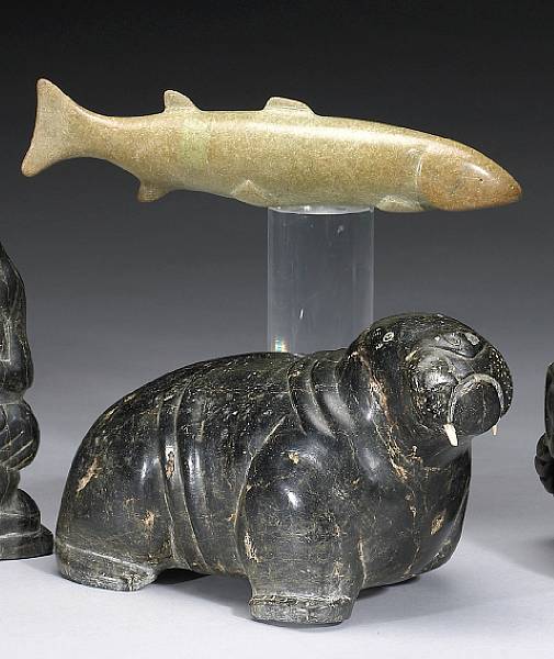 Appraisal: Eskimo and Northwest Including a walrus with ivory tusks replaced