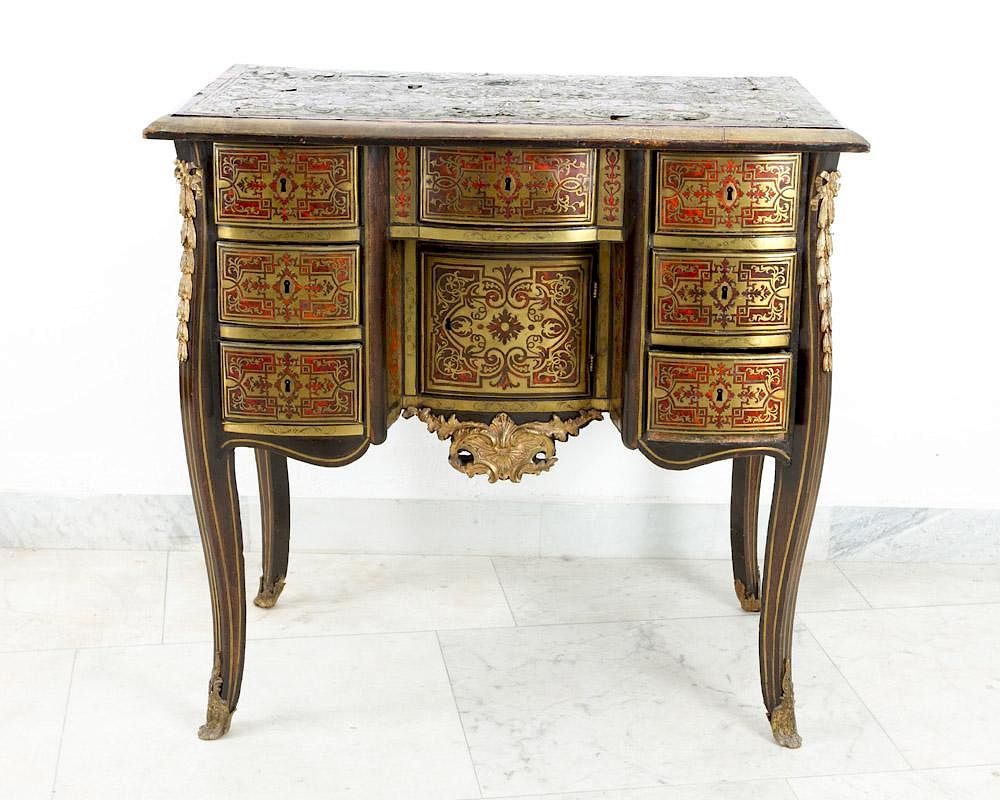 Appraisal: A French baroque small writing desk decorated in Boule technique