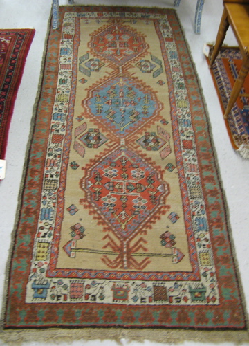 Appraisal: TWO SEMI-ANTIQUE PERSIAN TRIBAL AREA RUGS Sarab runner Azerbaijan region