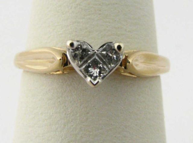 Appraisal: k yellow gold princess cut diamond heart ring Total diamond