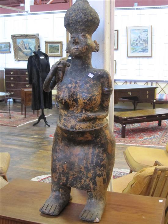 Appraisal: TRIBAL FIGURE Mottled metal Female figure H