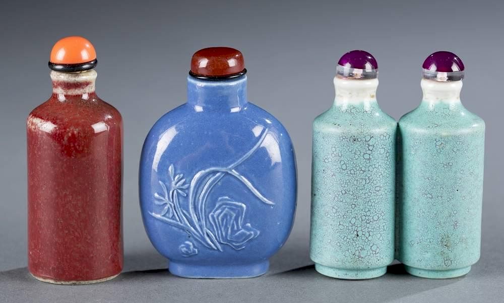 Appraisal: Group of three Chinese porcelain snuff bottles A group of