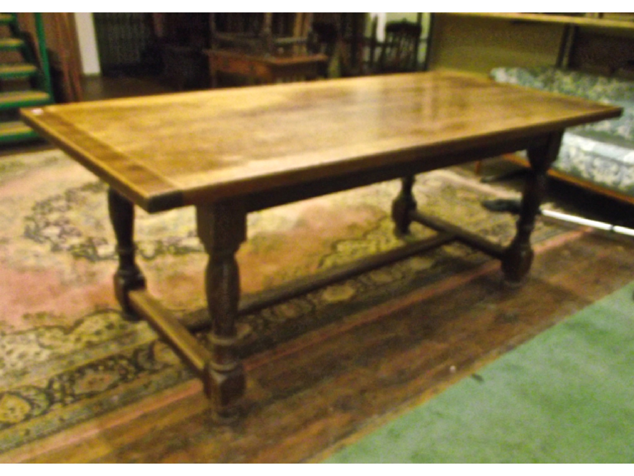 Appraisal: A traditional oak refectory table the plank top with cleated