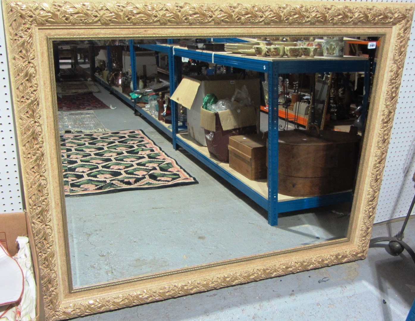 Appraisal: A large rectangular painted and parcel gilt mirror