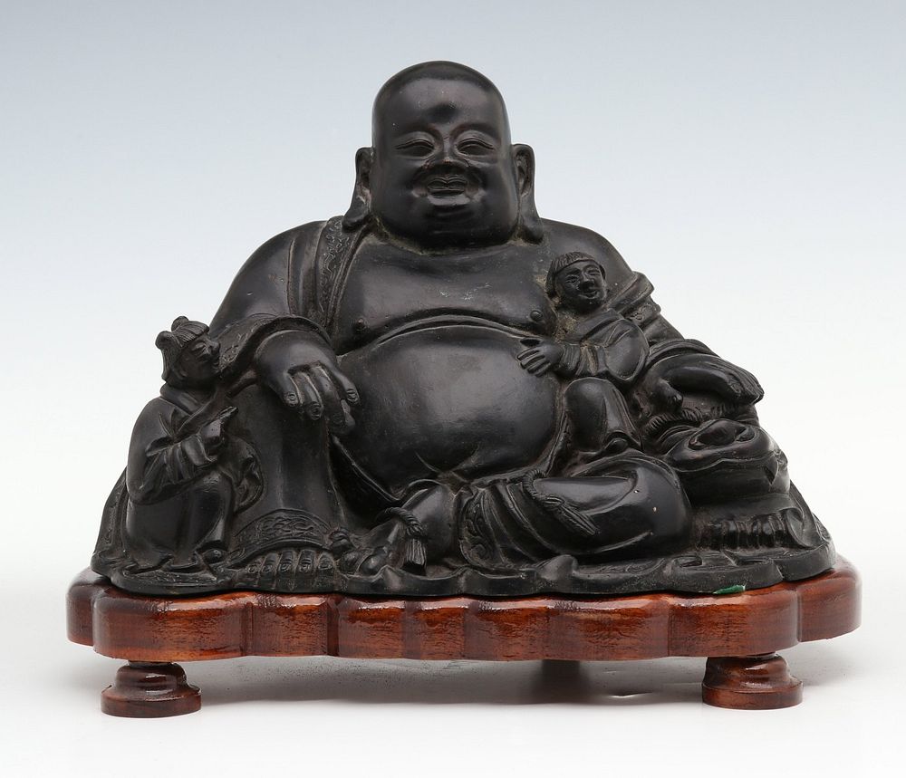 Appraisal: A LARGE PATINATED BRONZE FIGURE OF BUDDHA The smiling figure