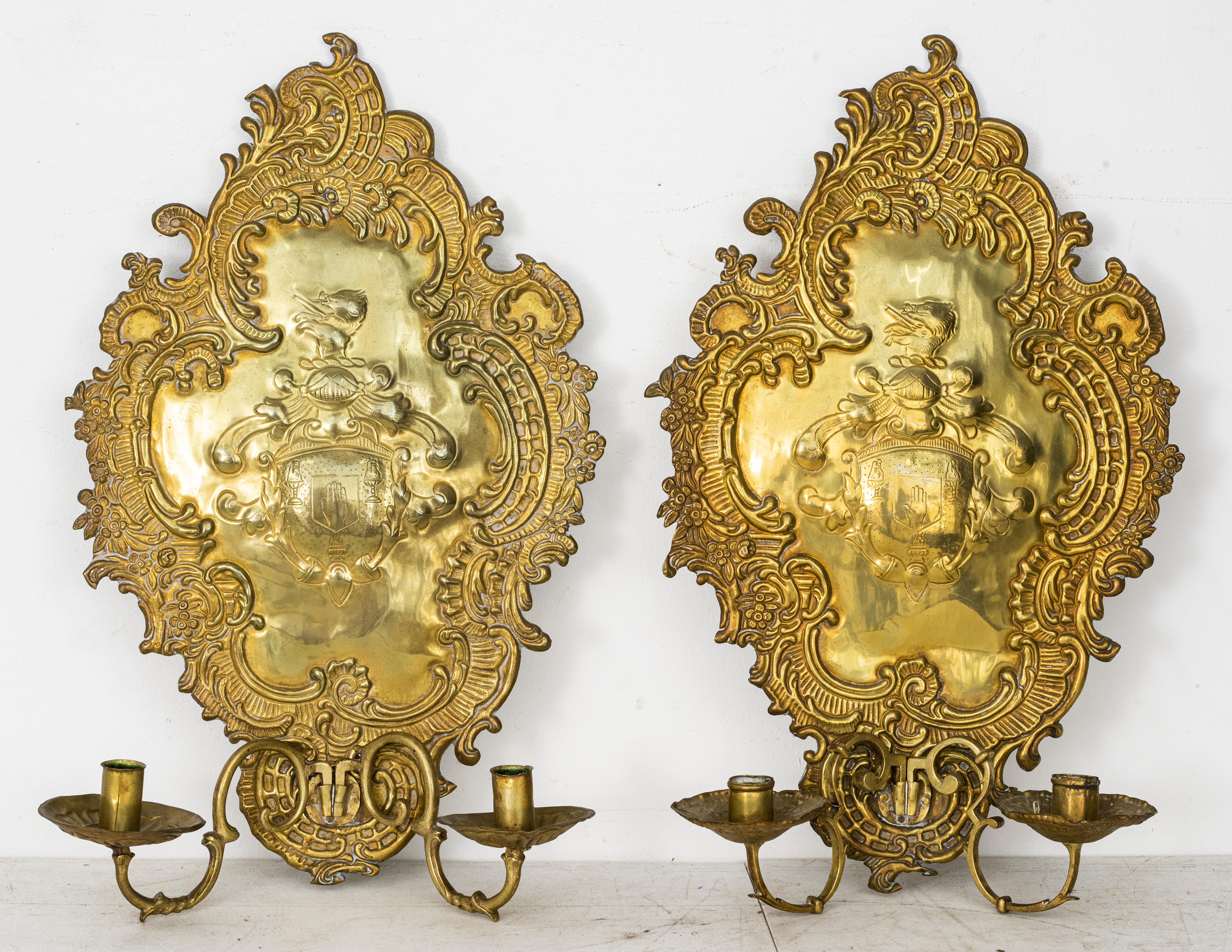 Appraisal: BAROQUE REVIVAL ARMORIAL BRASS CANDLE SCONCES PR Continental Baroque revival