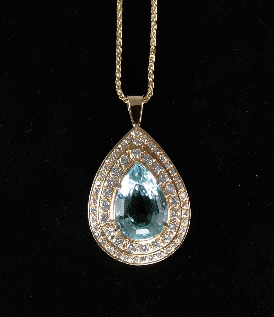 Appraisal: AQUAMARINE DIAMOND PENDANT This very lovely k yellow gold pendant