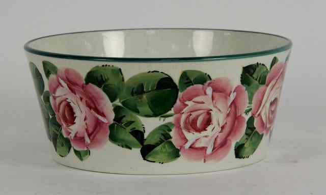 Appraisal: A Wemyss pottery bowl decorated roses to the sides impressed