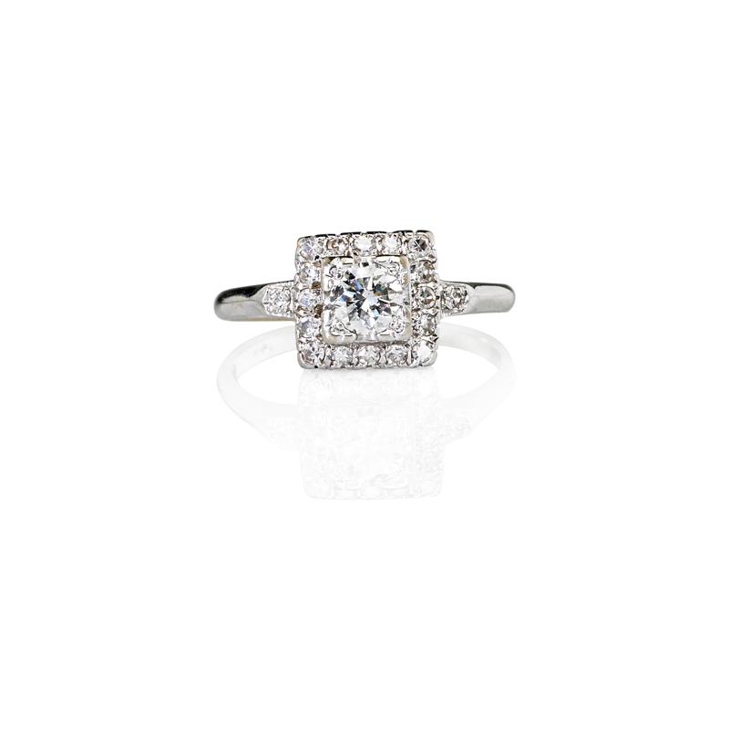 Appraisal: SQUARE SET DIAMOND K WHITE GOLD CLUSTER RING Principal fine