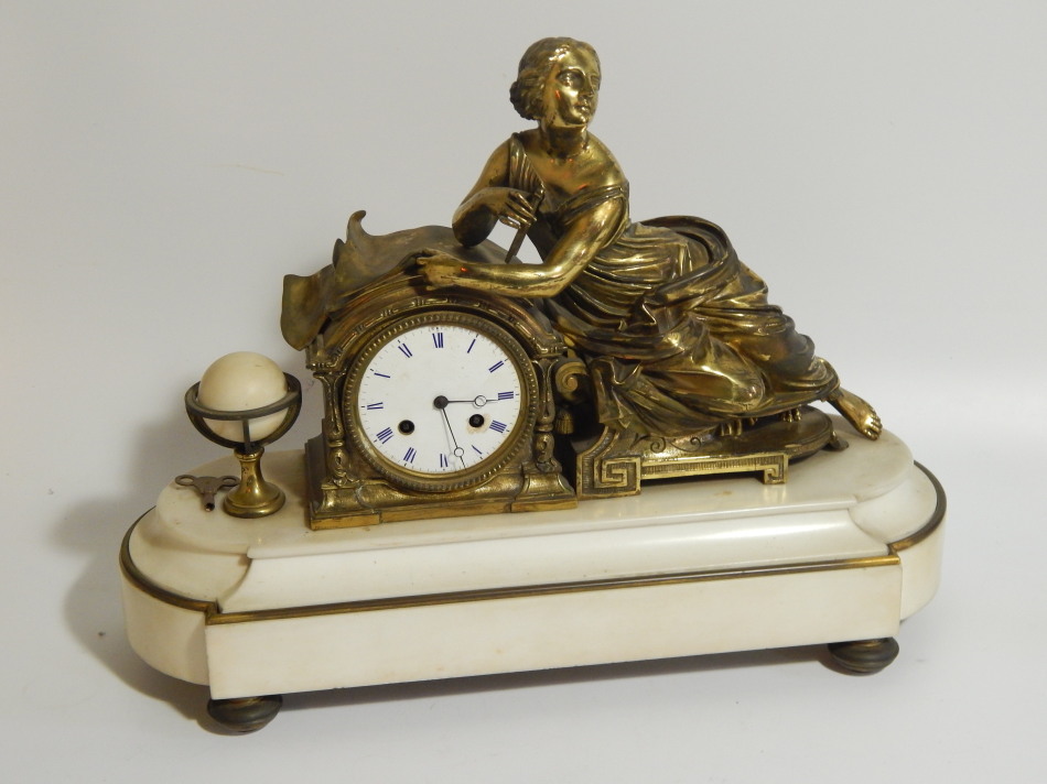 Appraisal: A thC French white marble and gilt spelter mantel clock