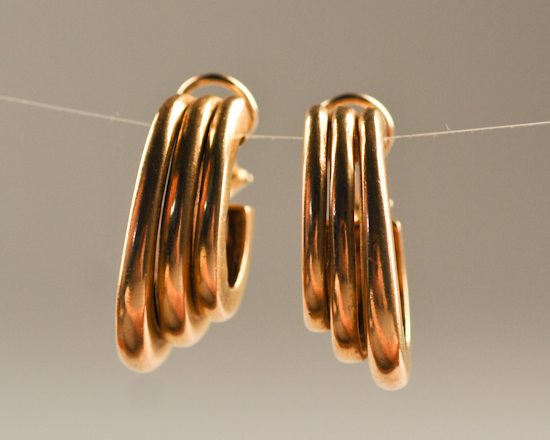 Appraisal: A Pair of Gold Triple Half Hoop Earrings K marked