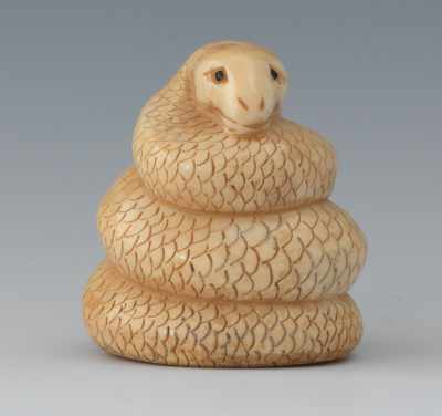 Appraisal: A Carved Ivory Netsuke of a Coiled Snake Carved ivory