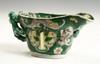 Appraisal: LIBATION CUP - Kangxi period famille verte helmet shaped libation