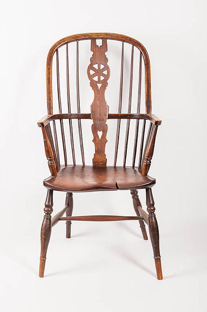 Appraisal: A TH CENTURY ASH AND ELM SADDLE SEATED WINDSOR CHAIR