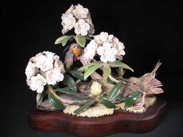 Appraisal: Boehm bisque figurine titled ''Pekin Robins'' Depicts two Robin birds