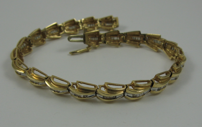 Appraisal: DIAMOND AND K GOLD BRACELET in length and set with