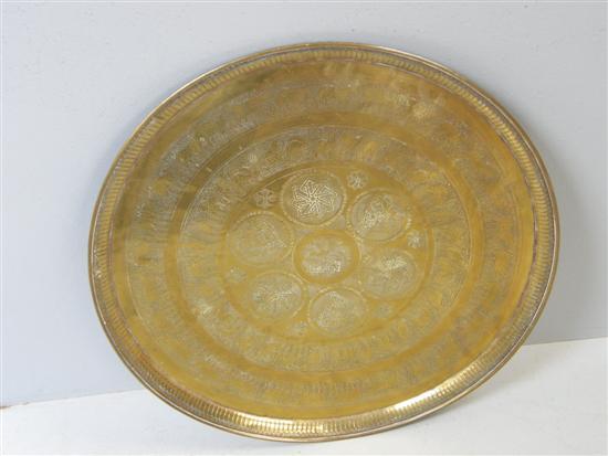 Appraisal: Indian brass tray with engraved decoration diameter PROVENANCE Thetis Blacker