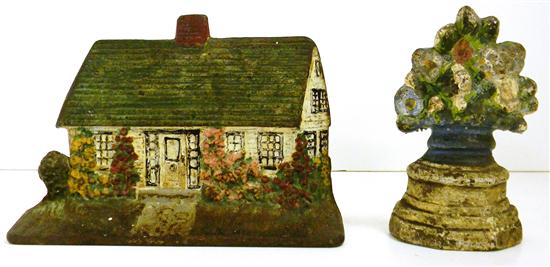 Appraisal: Two iron doorstops a cottage signed Albany '' h and