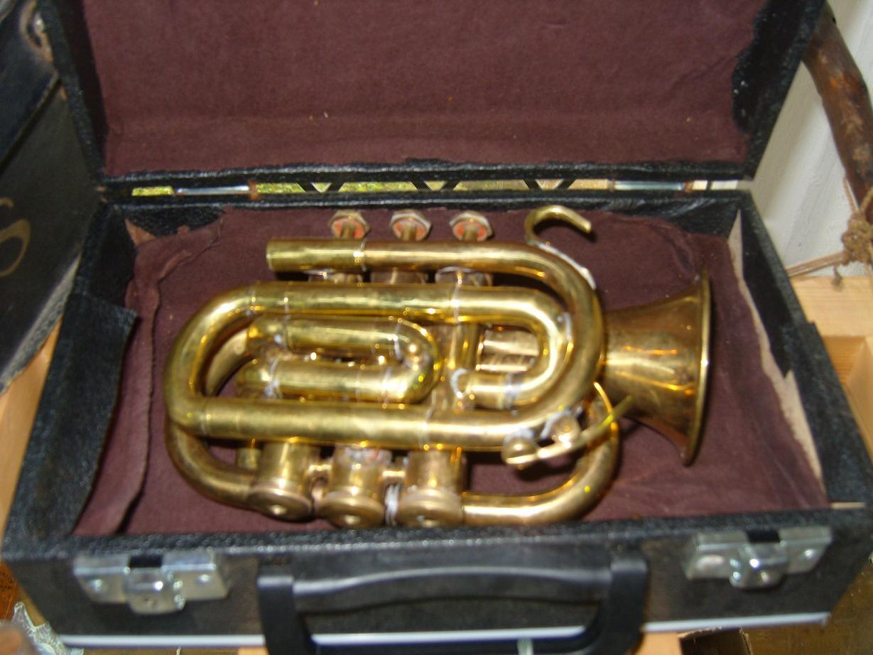 Appraisal: A cased Piccolo cornet marked Bessons Co -