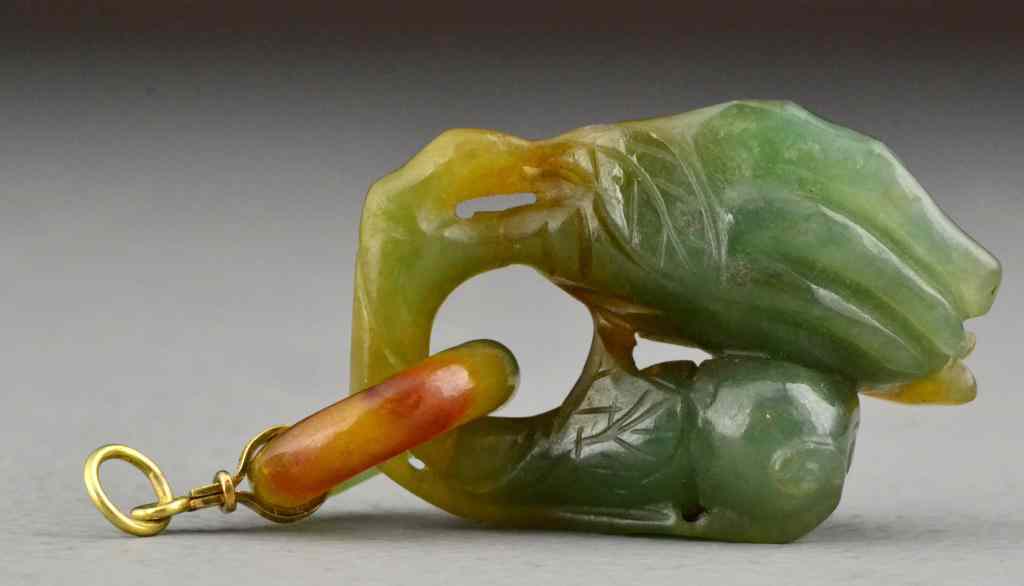 Appraisal: Chinese Qing K Gold Mounted Jadeite PendantTwo color jadeite finger