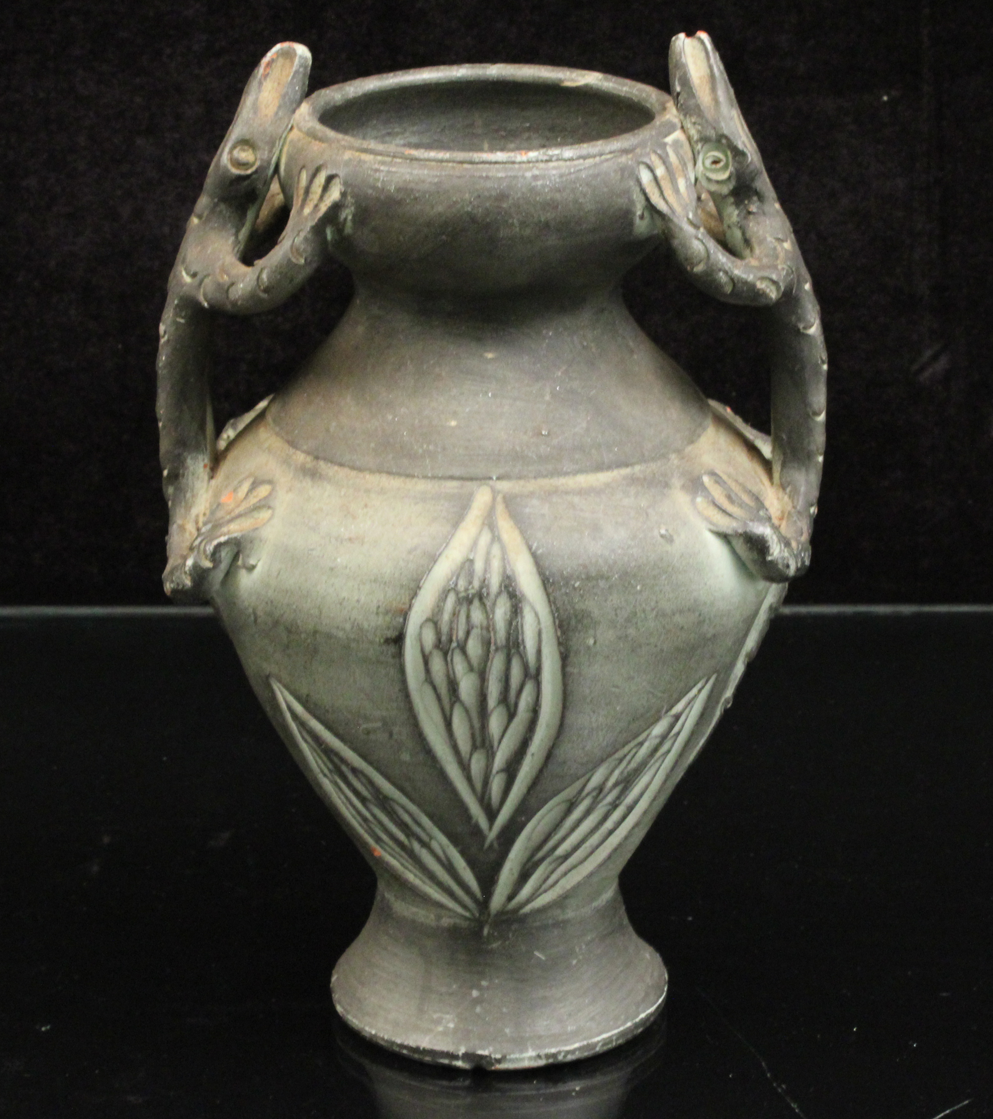 Appraisal: NEOCLASSICAL MEXICAN POTTERY VASE A glazed pottery vase with lizard